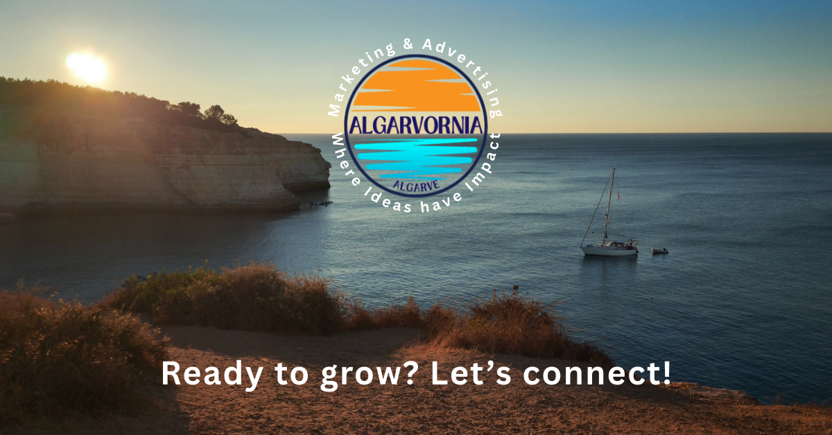 a sailboat in the ocean in front of cliffs