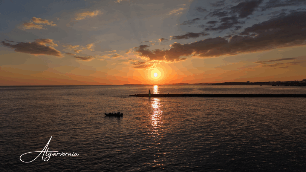 Algarvornia Benagil Cave tickets and marketing, ocean with cliffs and a lighthouse on top