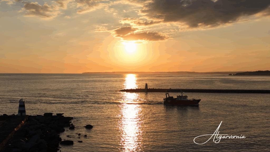 Algarvornia Benagil Cave tickets and marketing, ocean with cliffs and a lighthouse on top